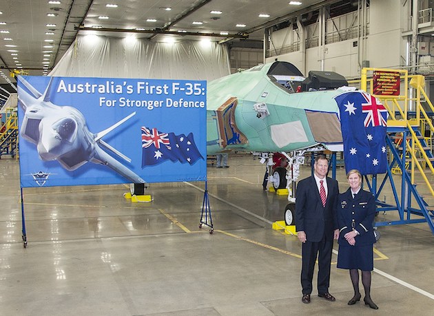 Air Commodore Cath Roberts with Jeff Babione in front of AU-1. (Lockheed Martin)