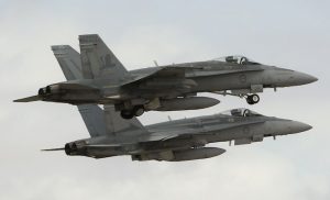 Two 75SQN operated Hornets depart Andersen AFB during Cope North 14. (Defence)