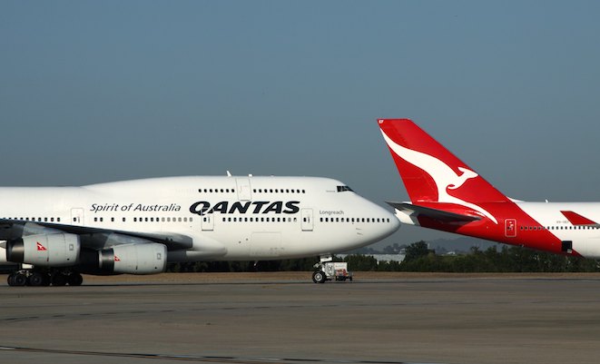 Qantas is splitting off its international operations, and has written down the value of its international aircraft fleet. (Rob Finlayon)