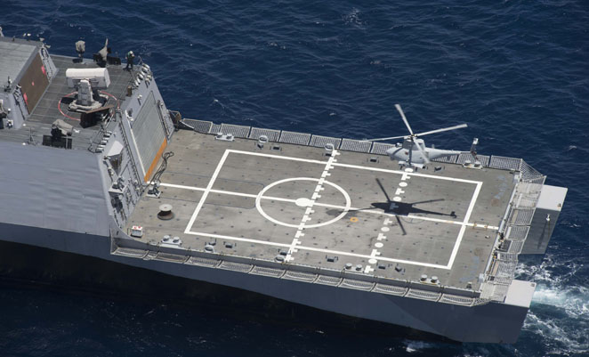 The unmanned MQ-8B Fire Scout recovers aboard USS Freedom during the demonstration. (US Navy)