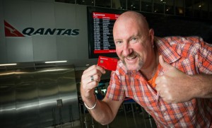 QFF's 10 millionth member, Grant Welsh, celebrates the milestone. (Qantas)