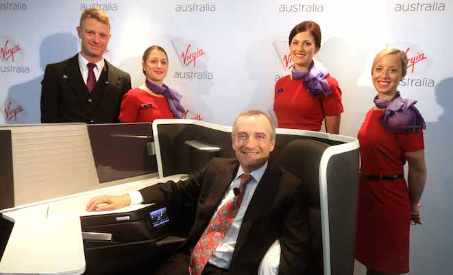 Virgin Australia chief executive John Borghetti unveils the airline's new business class seat. (Geoffrey Thomas)