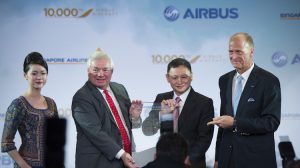 Airbus and Singapore Airlines executives celebrate the 10,000th Airbus aircraft delivery. (Airbus)
