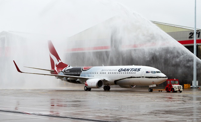 An ARFF salute for Qantas Boeing 737 VH-XZJ in Sydney. (Seth Jaworski)
