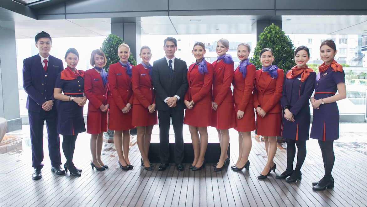 Hong Kong Airlines vice chairman Tang King-shing with cabin crew from Virgin Australia and Hong Kong Airlines. (Virgin Australia)