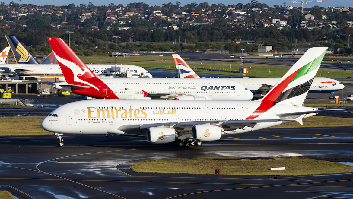 A trio of Airbus A380s at Sydney Airport alongside a Boeing 777-300ER. (Seth Jaworski)