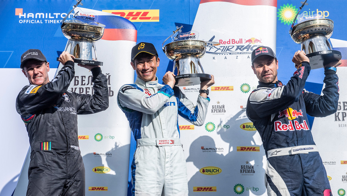 Matt Hall of Australia (L), Yoshihide Muroya of Japan (C) and Martin Sonka of the Czech Republic on the podium after the second round of the Red Bull Air Race. (Red Bull Content Pool)