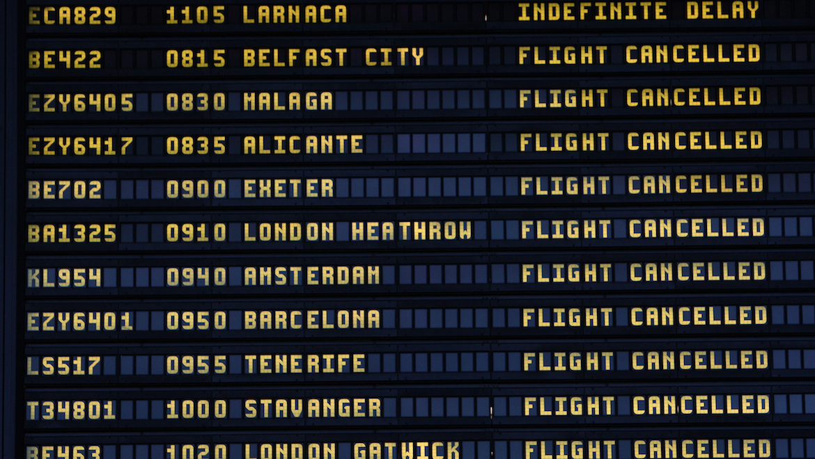 A departures board at Newcastle International Airport. (AP Photo/Scott Heppell)