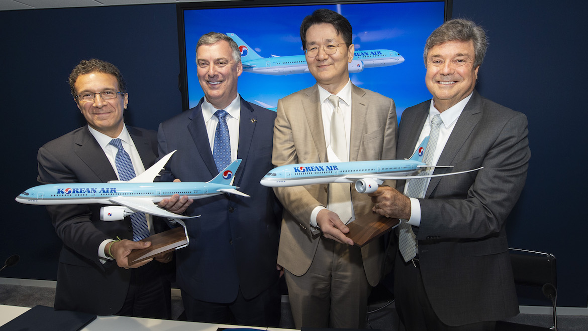 Boeing Commercial Airplanes Ihssane Mounir and Kevin McAllister alongside Korean Air's Walter Cho and Air Lease Corporation's John Plueger. (Korean Air)