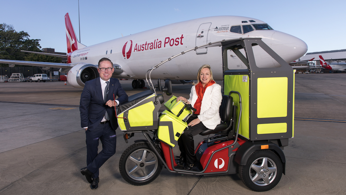 Qantas's Alan Joyce and Australia Post's Christine Holgate in front of a Qantas Freight/Australia Post Boeing 737-400SF VH-XNH. (Qantas)
