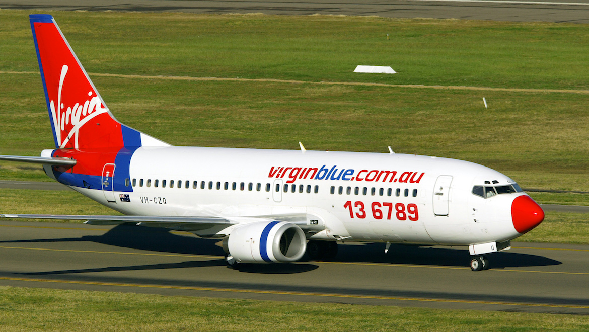 Following the Ansett collapse Virgin Blue briefly leased ex-Ansett 737‑300 VH-CZQ, wearing this unique predominantly white livery (Paul Sadler)