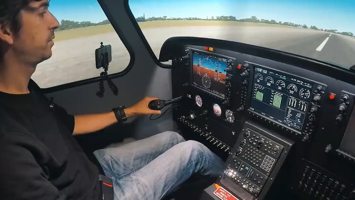 Ready for takeoff. Stef Drury’s tackles the sim. (Stef Drury/YouTube)