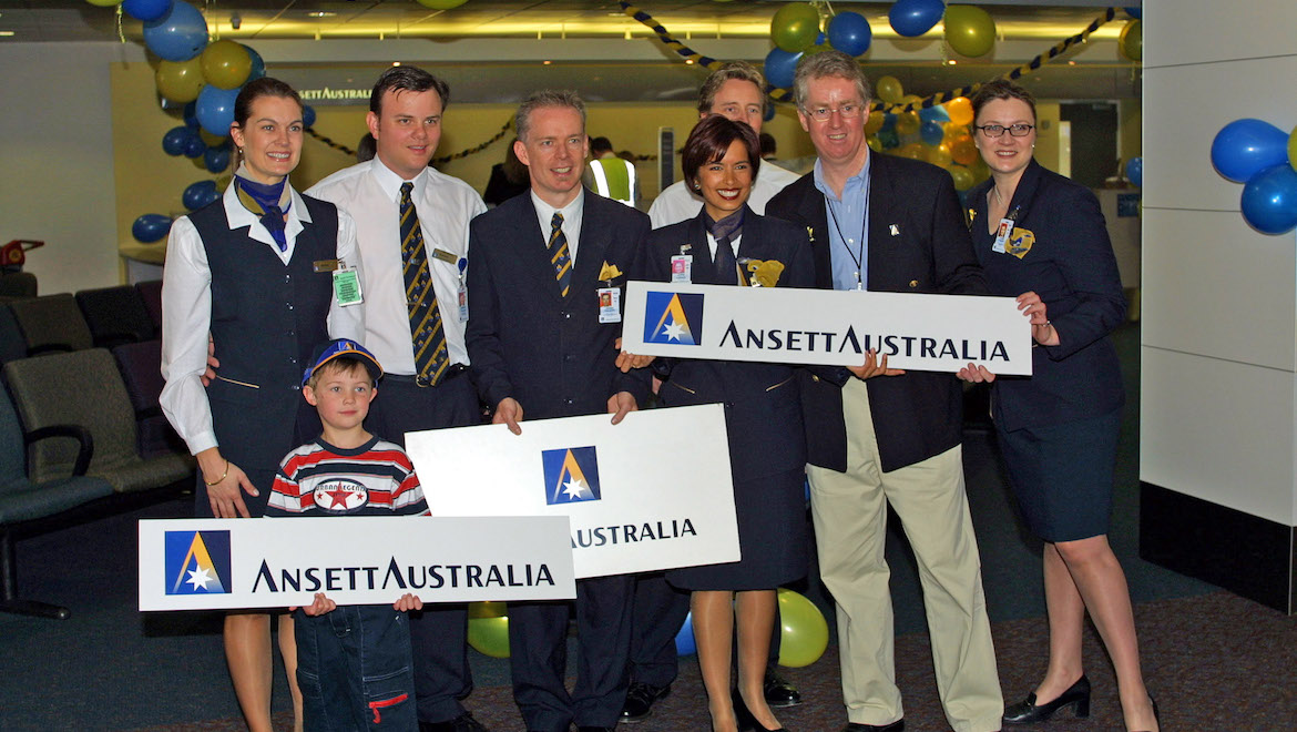 Ansett administrator Mark Mentha with Ansett staff at the launch of Ansett Mark II. The Ansett administrators put a skeleton operation back into the air – which ran from September 29 2001 to March 2002 – in the hope that having an operating entity would make it easier to find a buyer for the airline. (Paul Merritt)
