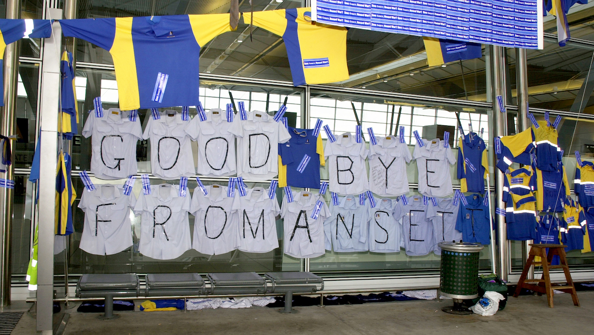 An emotional farewell. Staff shirts and messages decorate the Ansett Sydney terminal to mark the shut down of Ansett Mark II. (Paul Sadler)