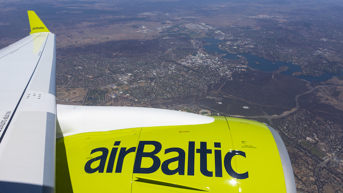 A view of the wing of the airBaltic A220-300 during the demonstration flight. (Seth Jaworski)